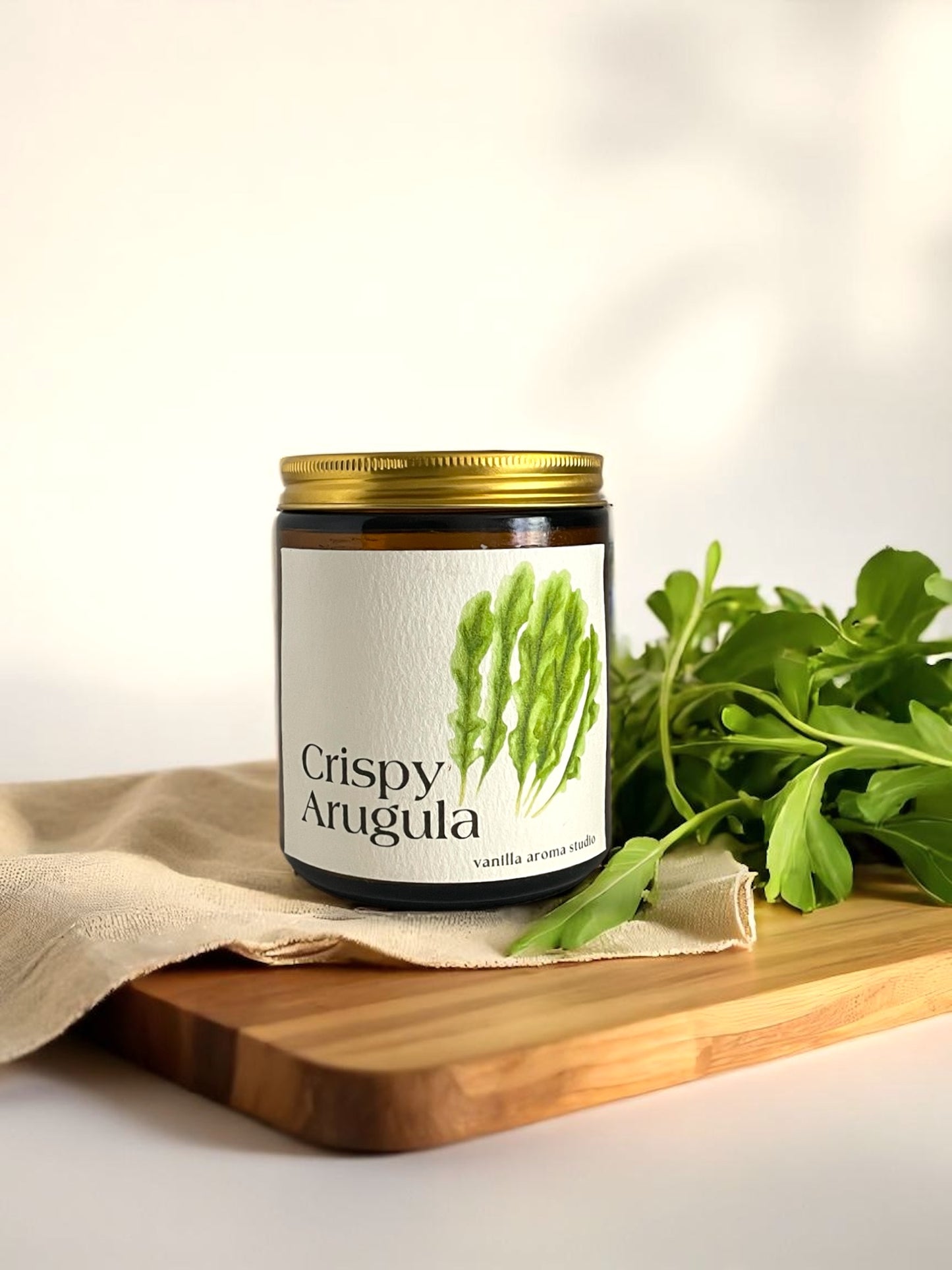 Crispy arugula coconut soy wax candle , hand poured into a cozy amber jar, made with non toxic ingredients.