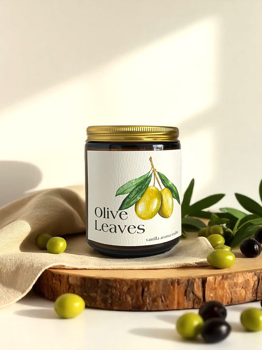 Olive Leaves coconut soy wax candle, hand poured into a cozy amber jar, made with non toxic ingredients.